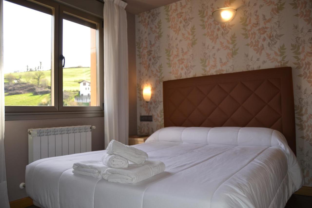 Apartamentos Spa Cueto กังกัส เด โอนิส ภายนอก รูปภาพ