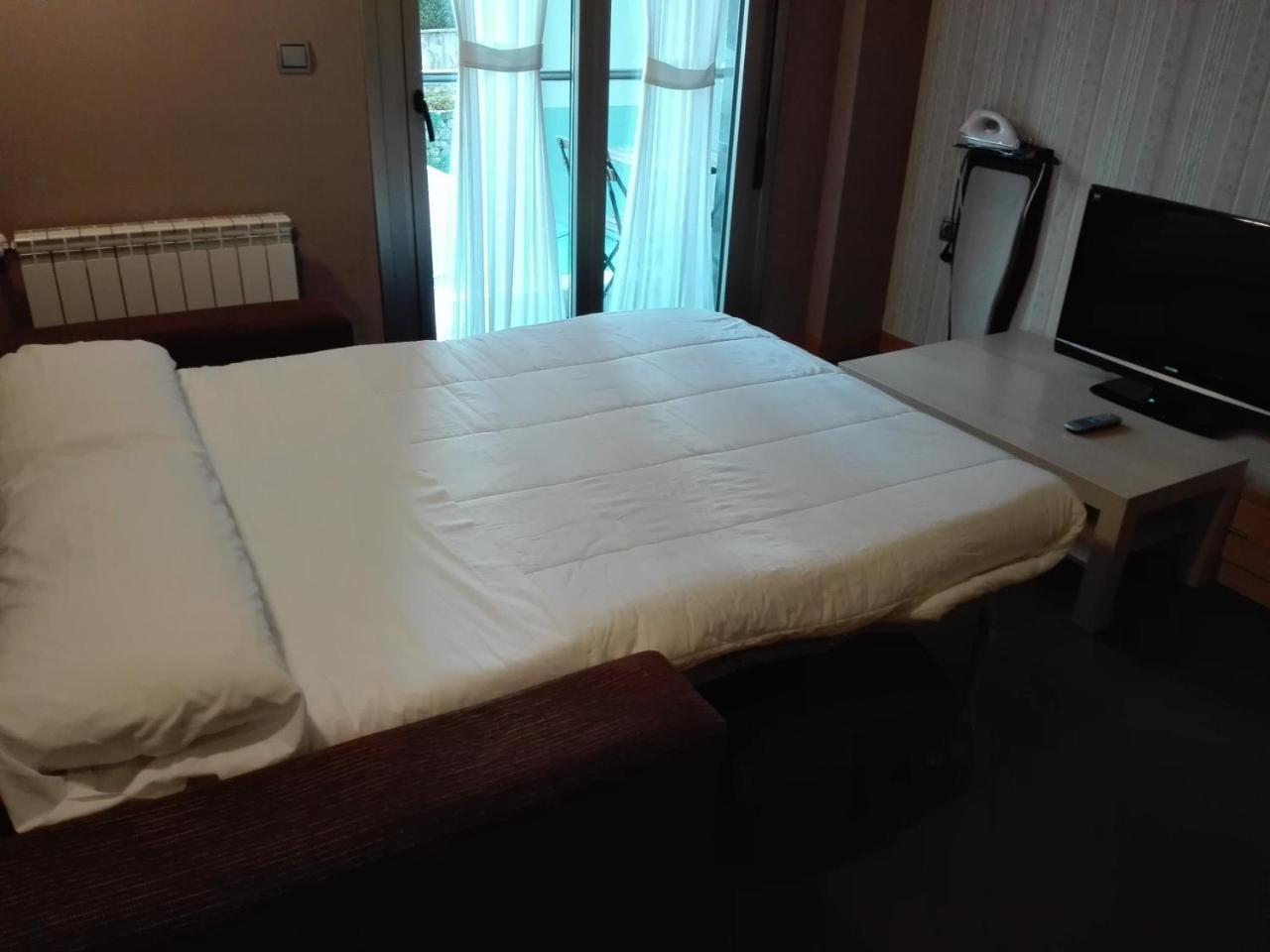 Apartamentos Spa Cueto กังกัส เด โอนิส ภายนอก รูปภาพ
